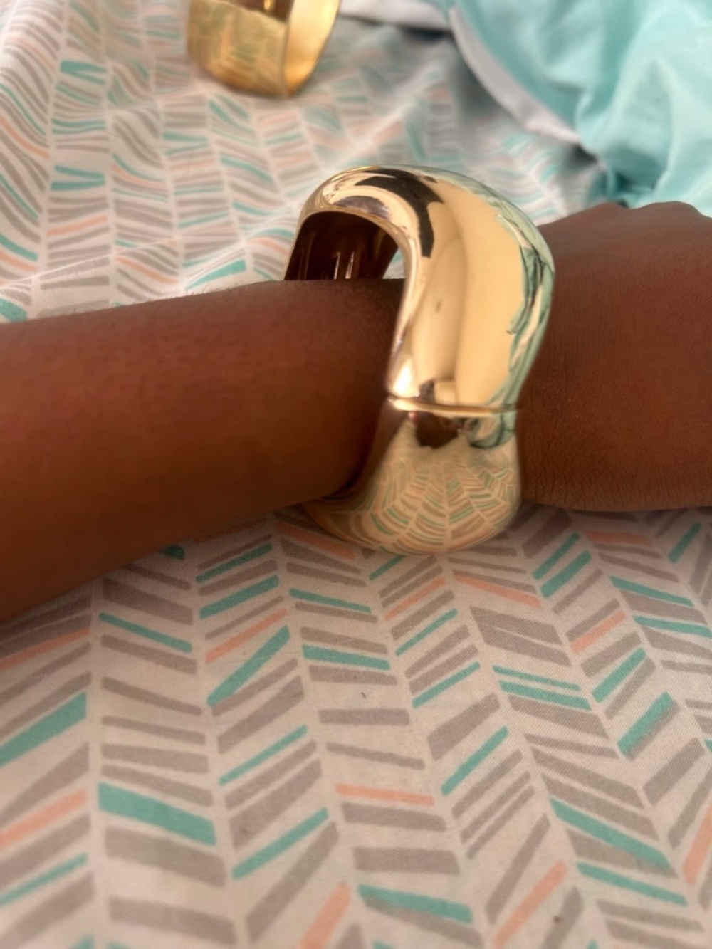 Gold swirly bangle